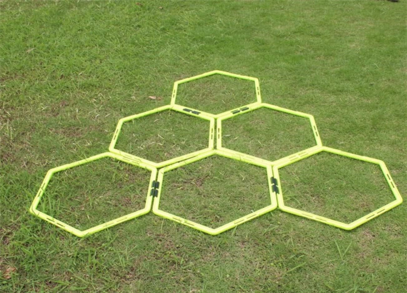 Ahoj Krása CoreStation hexagon training tool arranged on grass for speed and coordination training.